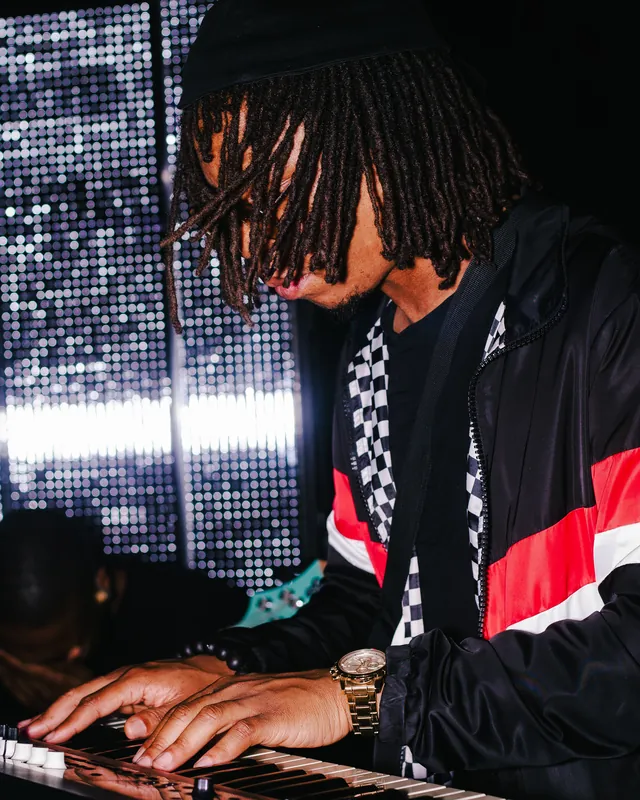 DJ working at a mixer during a live event